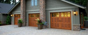 What are the benefits of having windows in a garage door?